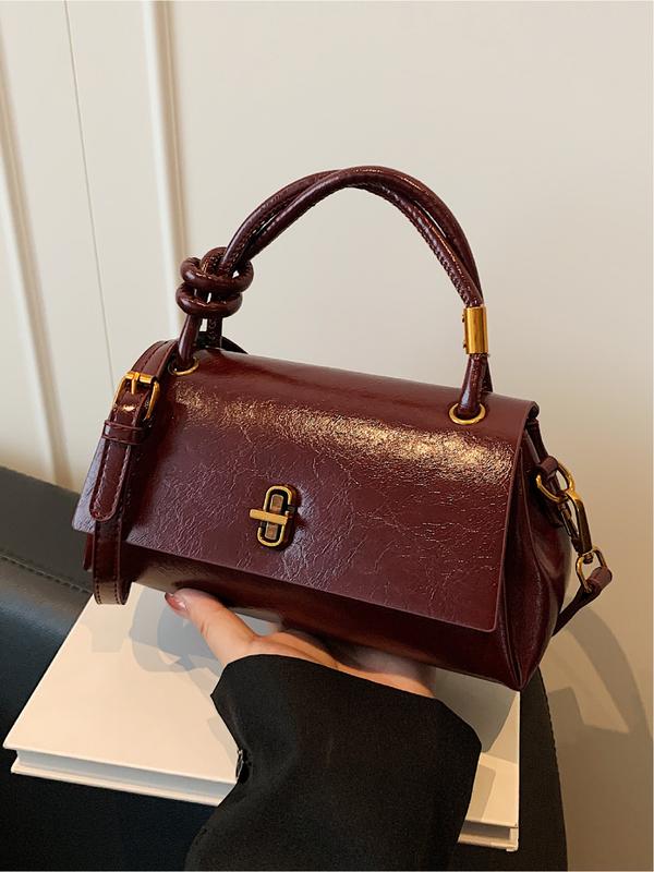 Bolso bandolera compacto burdeos