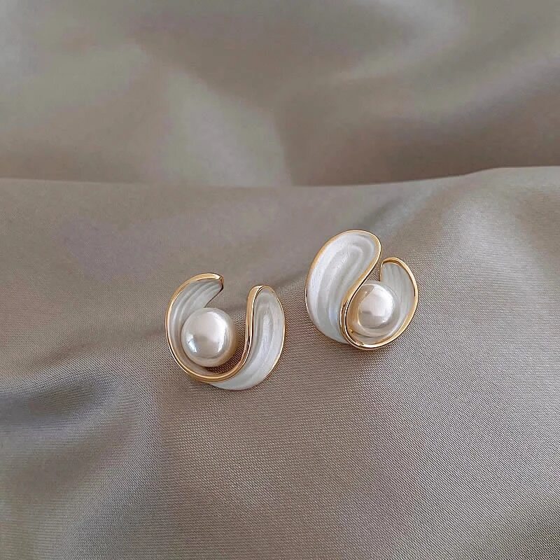 Pendientes dorados de perla