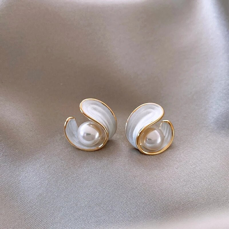 Pendientes dorados de perla