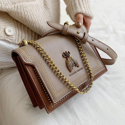 Bolso de mano con asa de cadena caqui