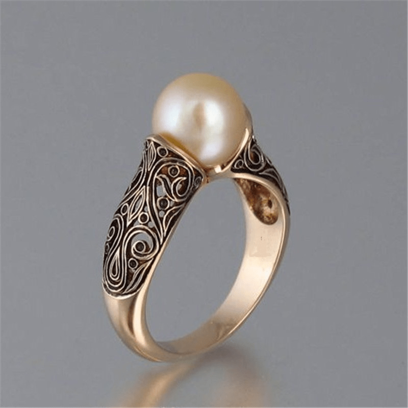 Anillo vintage de perla y oro